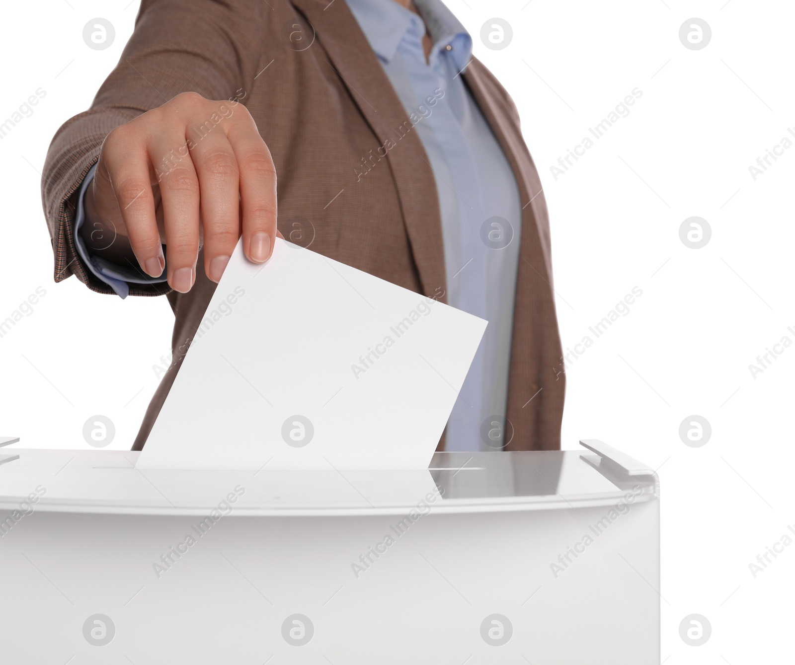 Photo of Woman putting her vote into ballot box on white background, closeup