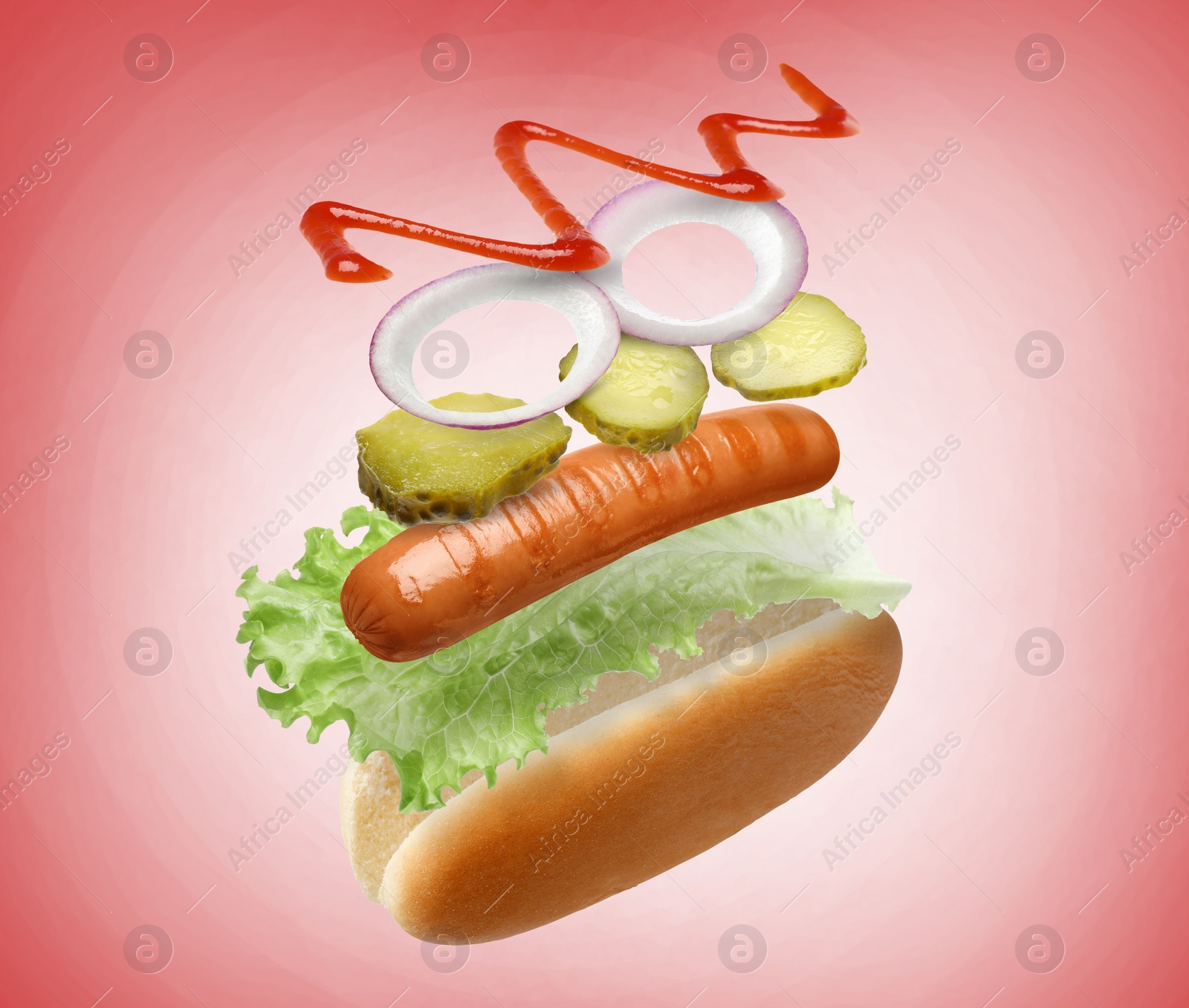 Image of Hot dog ingredients in air on red gradient background
