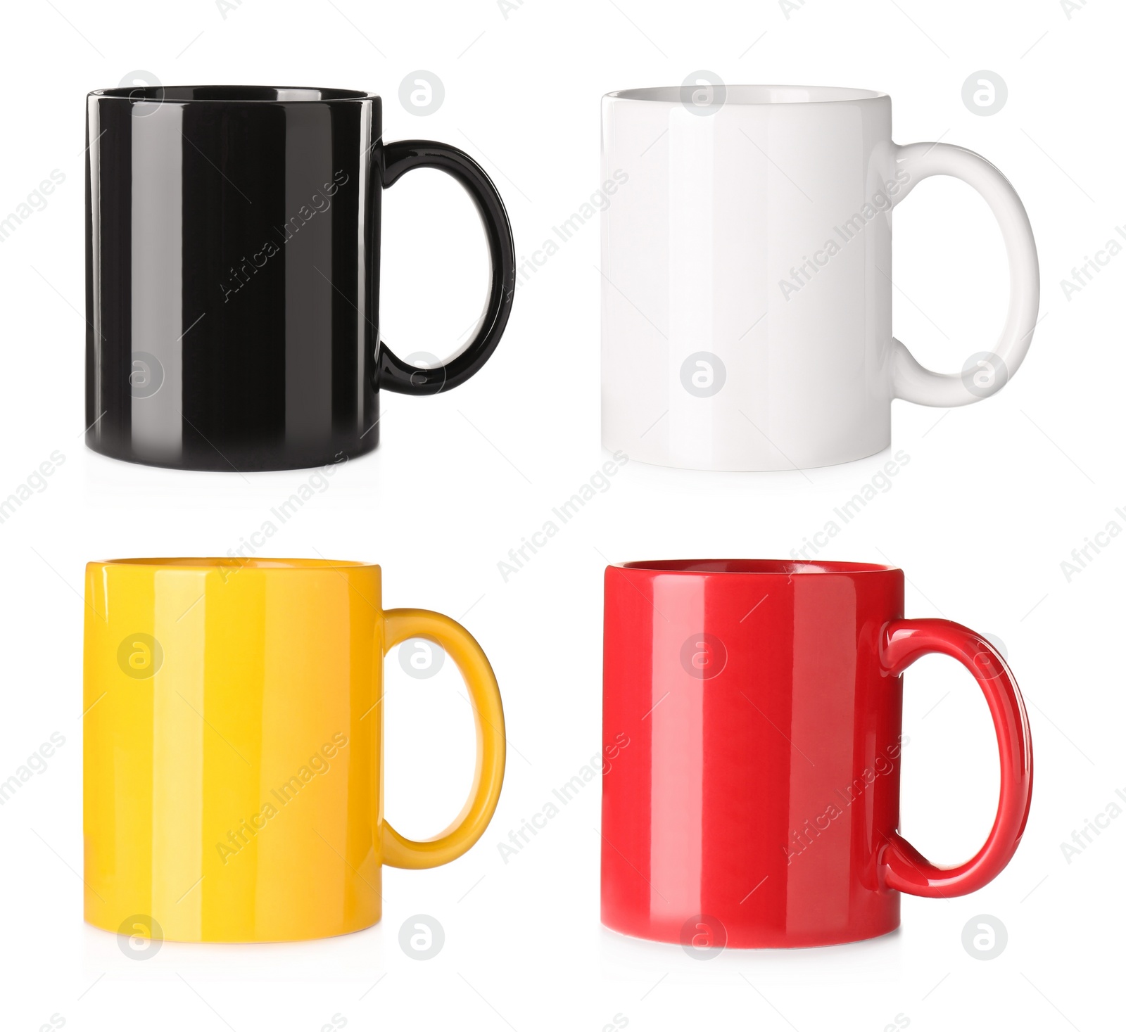 Image of Set with different ceramic mugs on white background