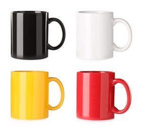 Image of Set with different ceramic mugs on white background