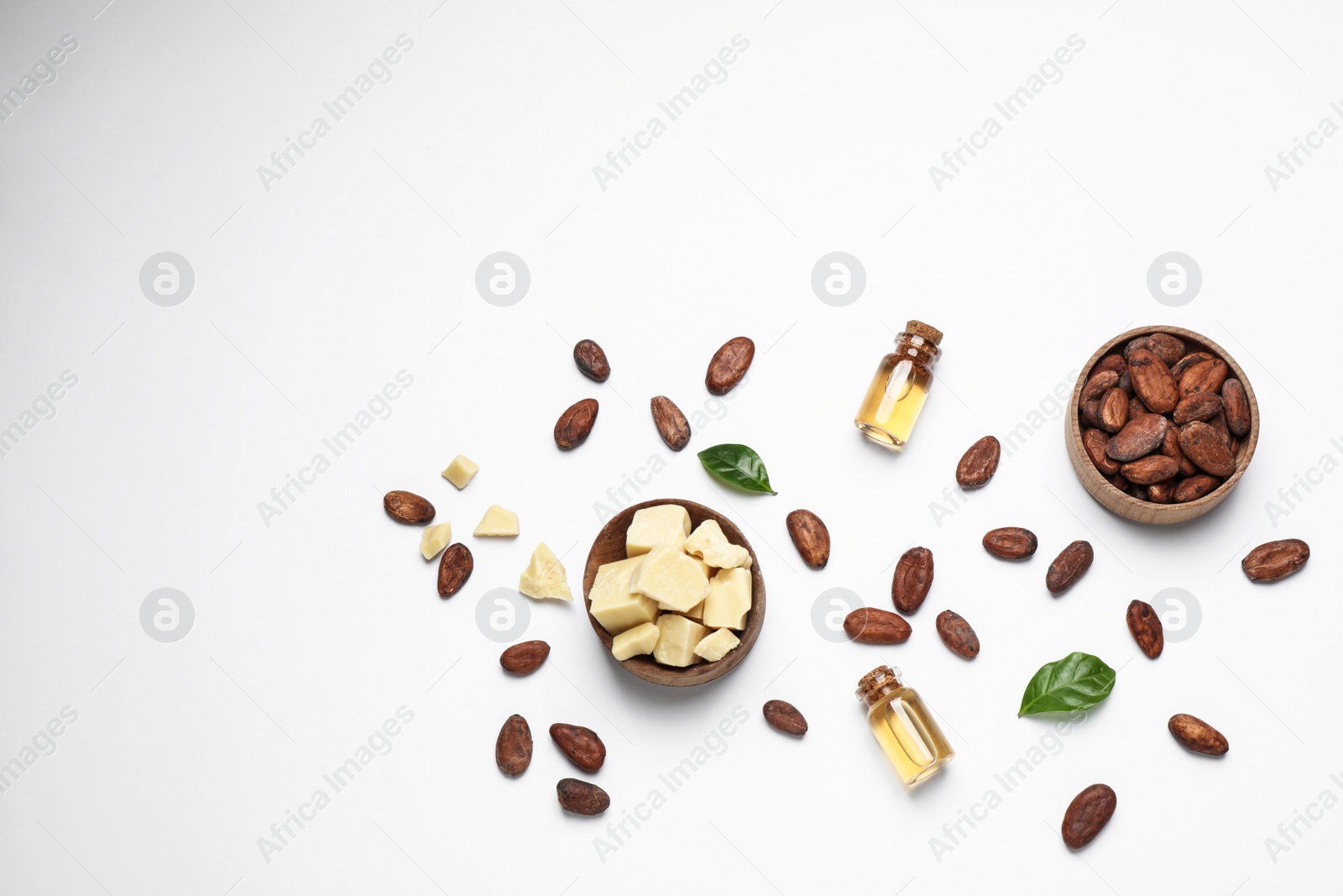 Photo of Composition with organic cocoa butter on white background, top view