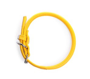 Photo of Yellow leather dog collar isolated on white, top view