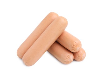 Many delicious boiled sausages on white background