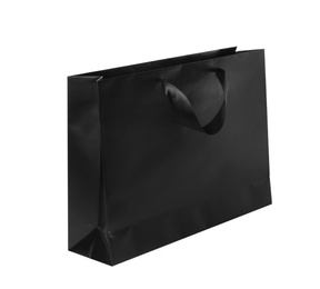 Photo of Paper shopping bag isolated on white. Mock up for design