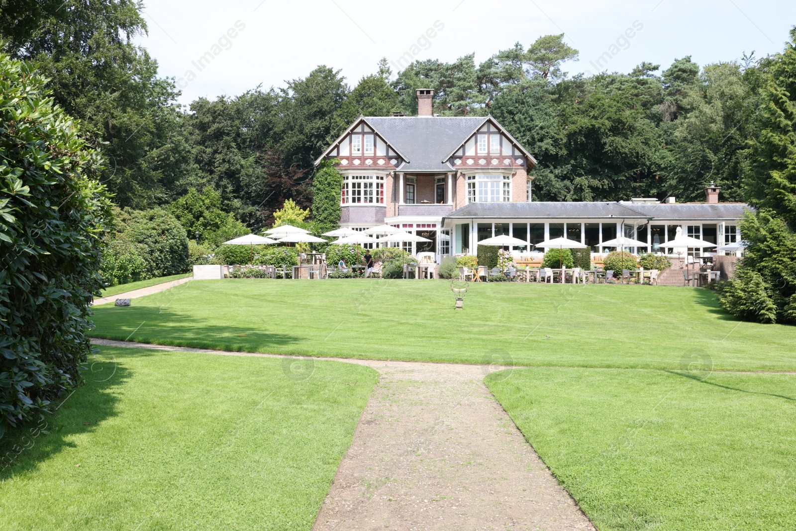 Photo of Ermelo, Netherlands - July 20, 2022: Luxury hotel Het Roode Koper and beautiful plants