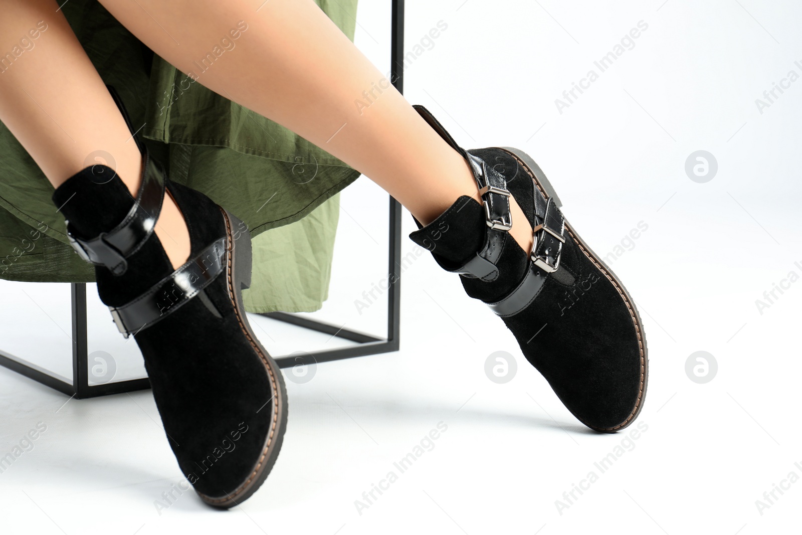 Photo of Woman in elegant shoes on white background, closeup