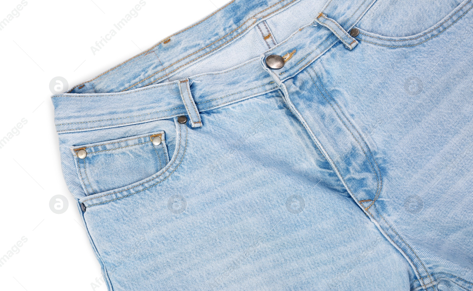 Photo of Stylish light blue jeans isolated on white, top view