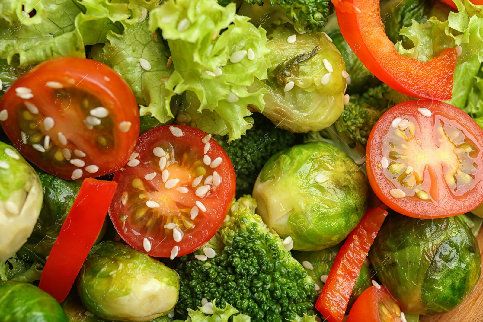 Photo of Tasty salad with Brussels sprouts, top view