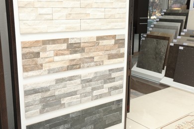 Many different samples of tiles on display in store