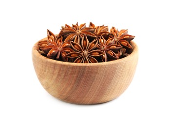 Photo of Wooden bowl with dry anise stars on white background