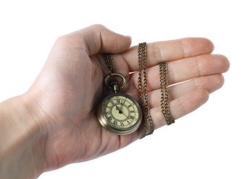 Woman holding pocket clock with chain on white background, closeup