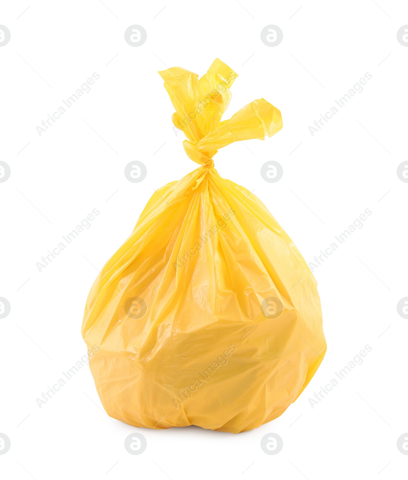 Photo of Yellow plastic garbage bag isolated on white