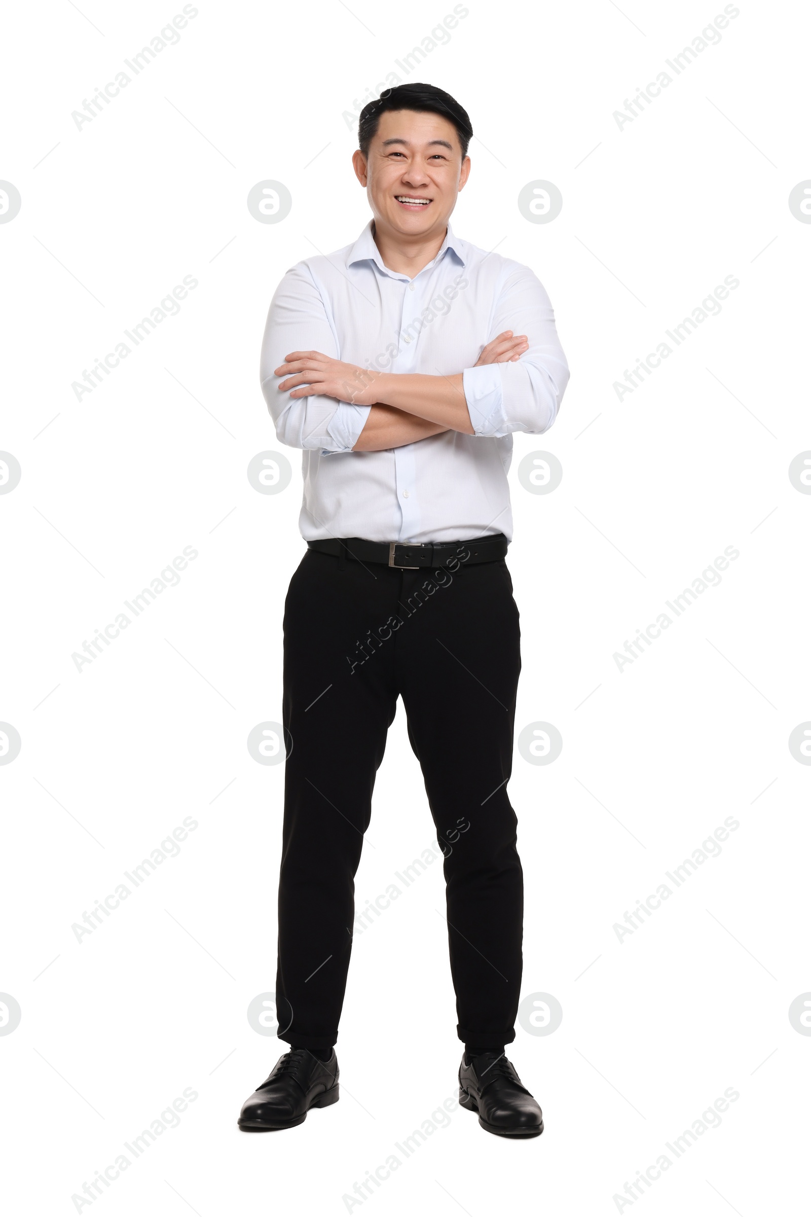 Photo of Businessman in formal clothes posing on white background