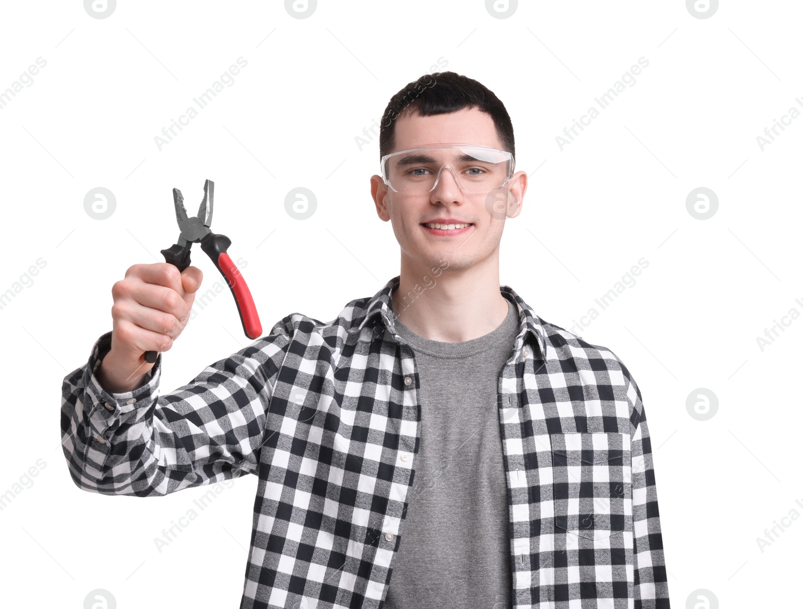 Photo of Young man holding pliers on white background