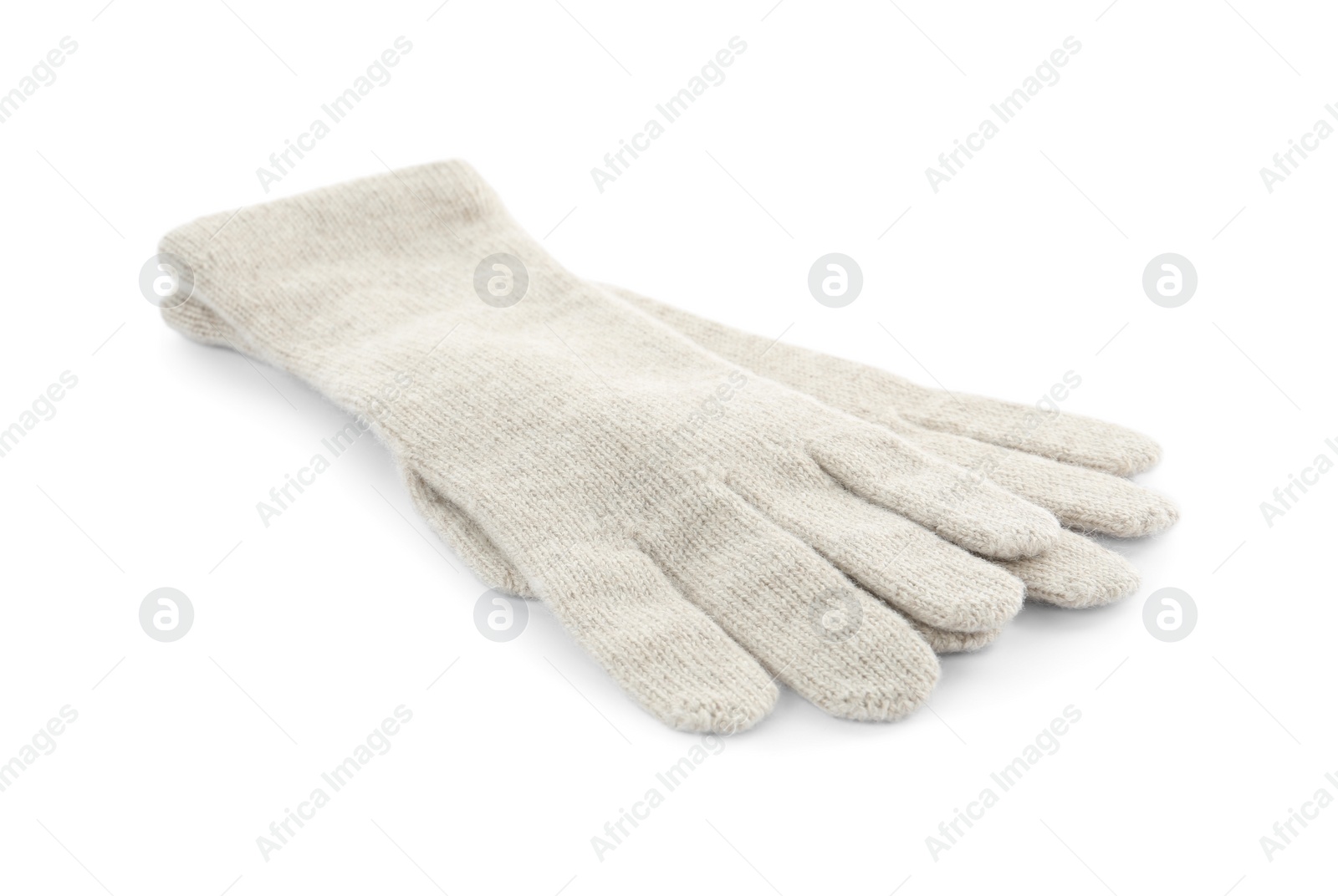 Photo of Pair of woolen gloves on white background. Winter clothes