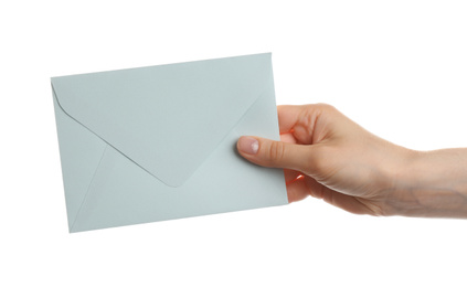 Woman holding paper envelope on white background, closeup