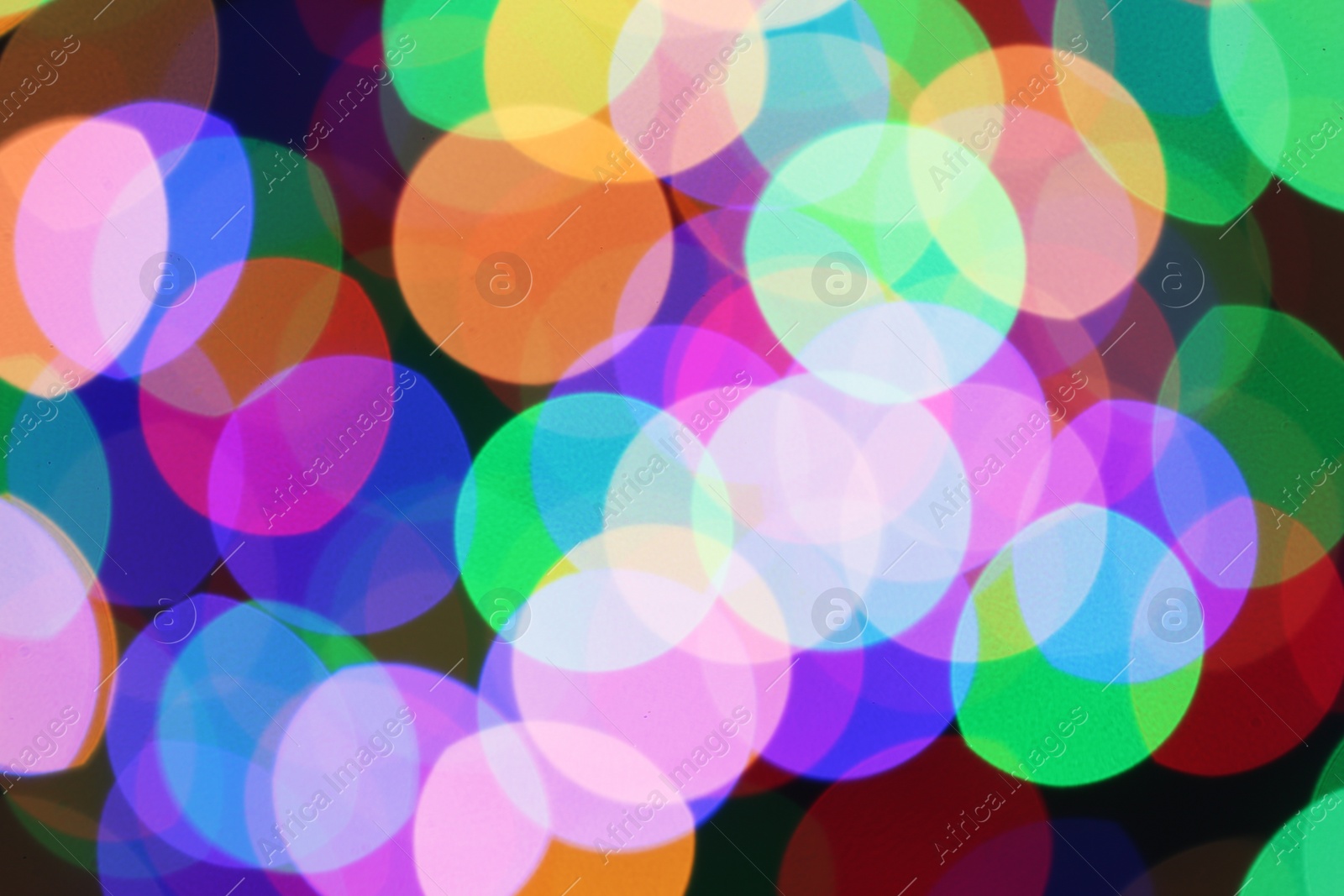 Photo of Beautiful colorful lights as background. Bokeh effect