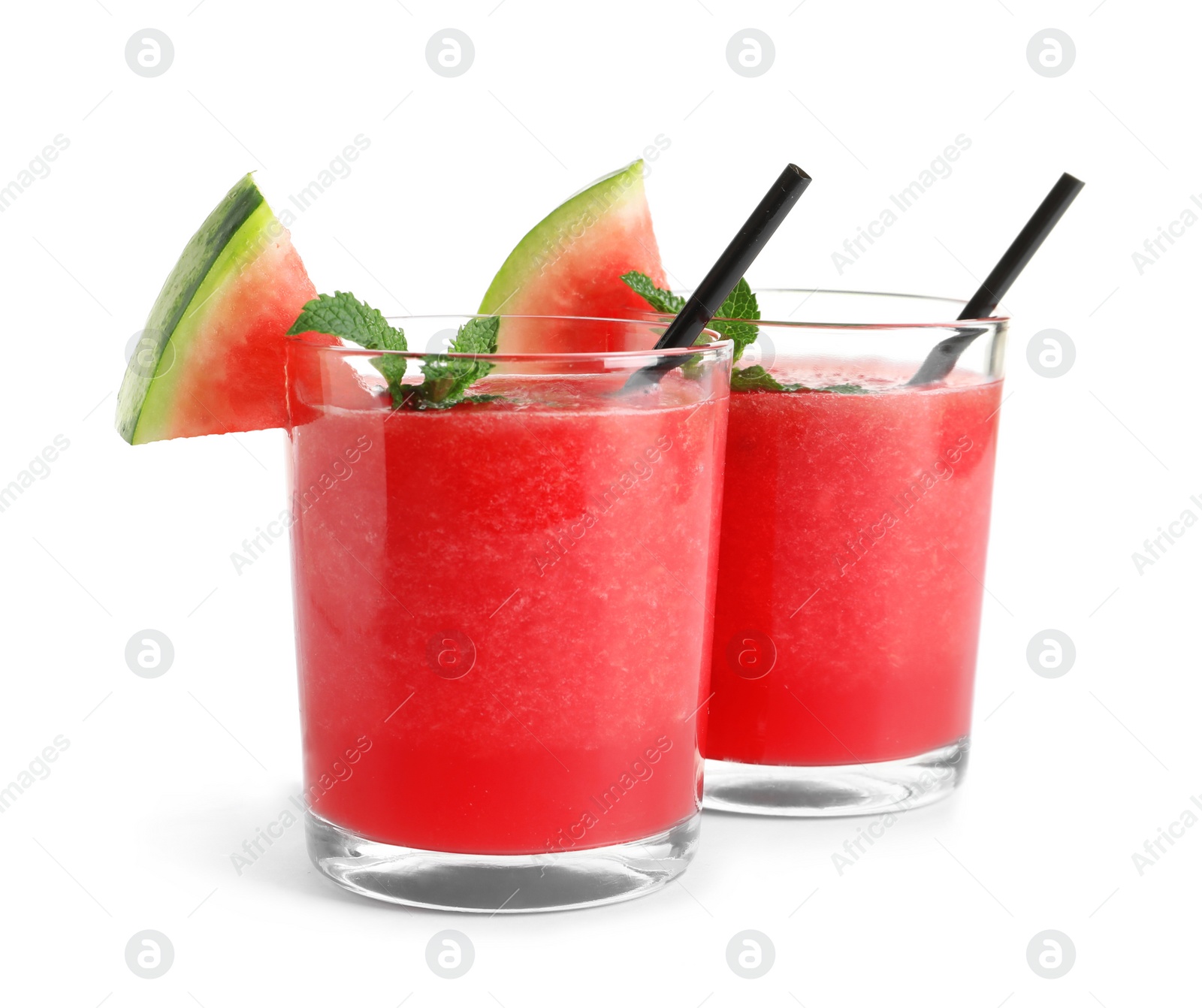 Photo of Tasty summer watermelon drink in glasses on white background