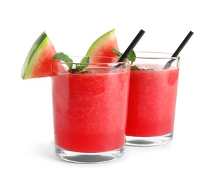 Photo of Tasty summer watermelon drink in glasses on white background