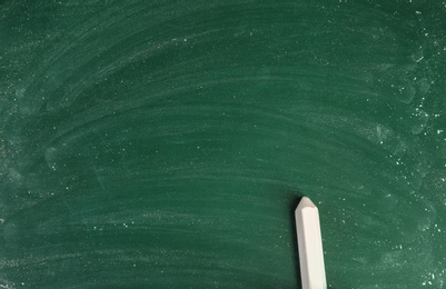 Photo of Chalk on green board with space for text