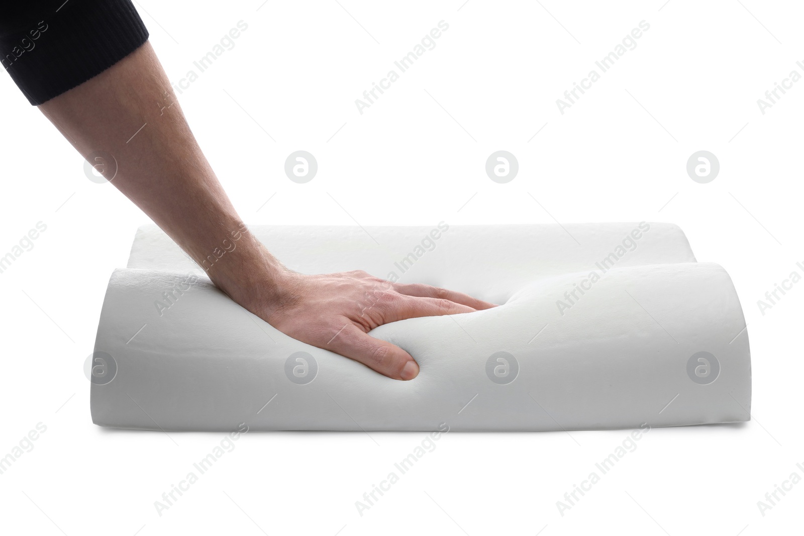 Photo of Man touching orthopedic memory foam pillow on white background, closeup