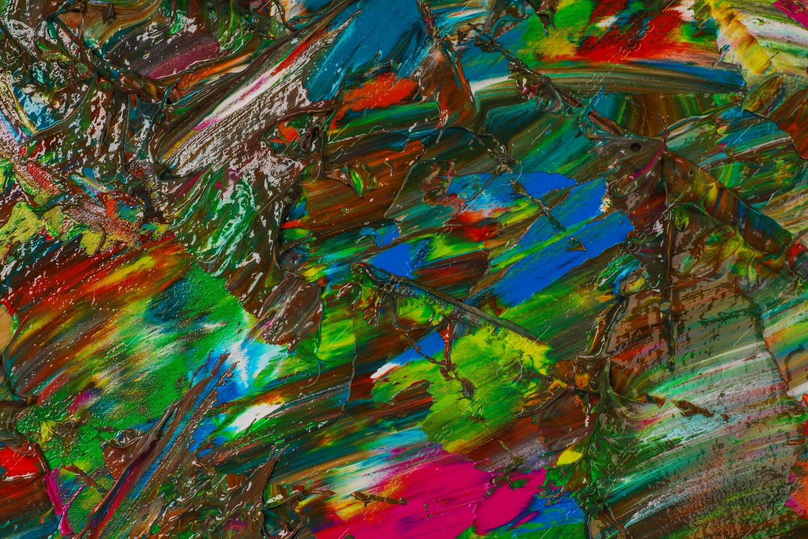 Photo of Abstract colorful acrylic paint as background, top view