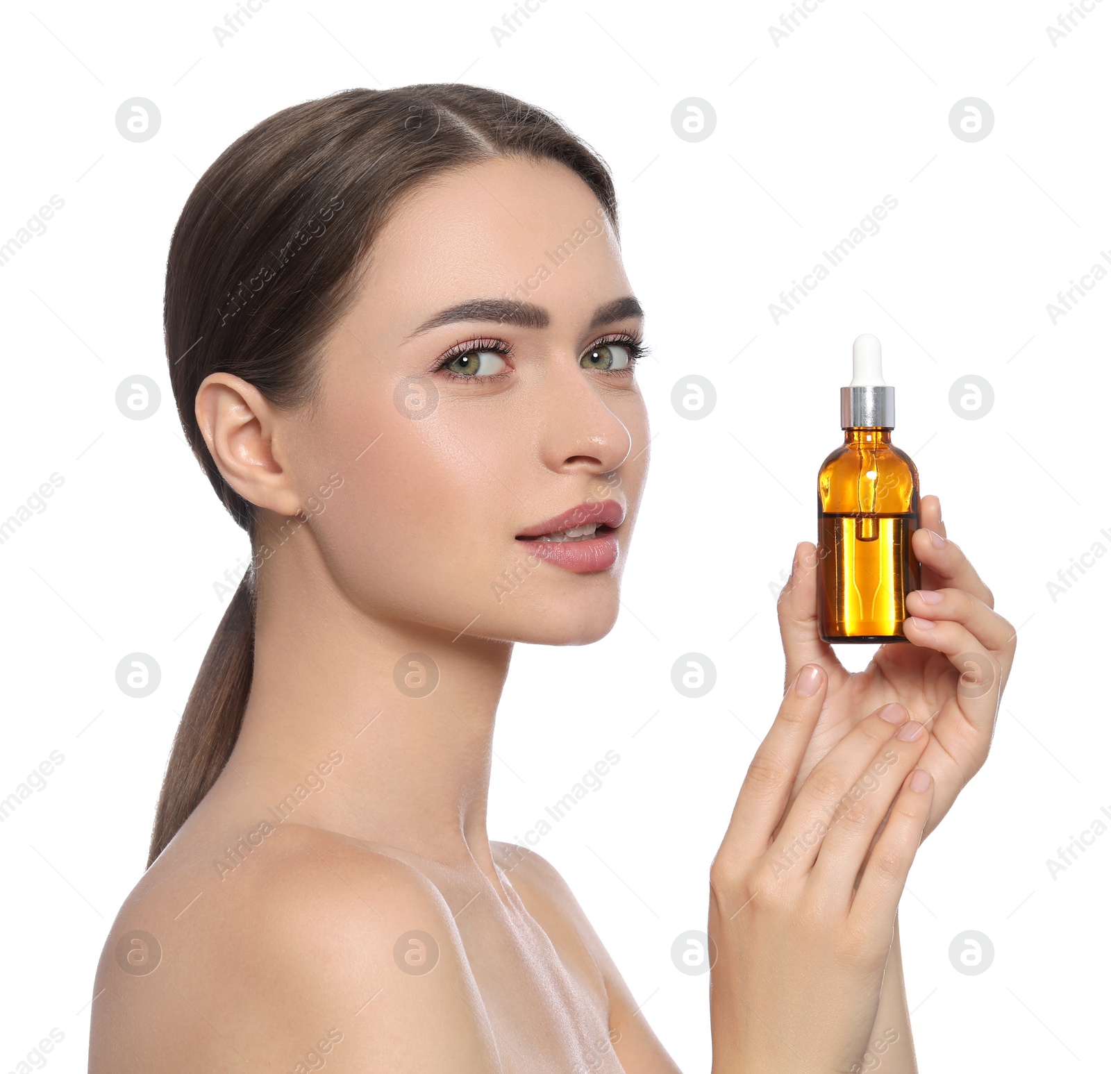 Photo of Young woman with bottle of essential oil on white background