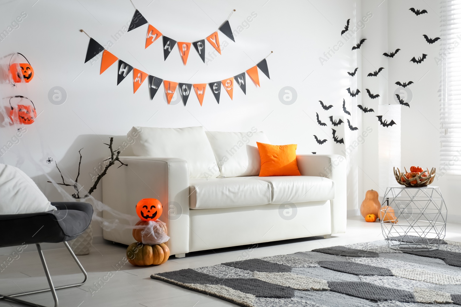 Photo of Modern room decorated for Halloween. Festive interior