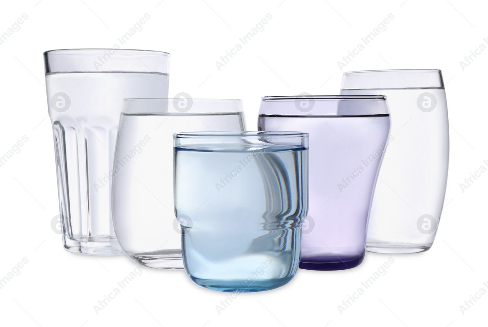 Photo of Different glasses of water on white background