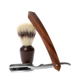 Photo of Shaving brush and razor for men on white background