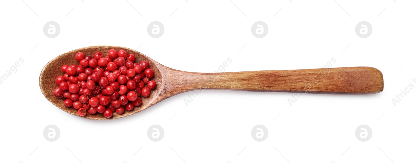 Photo of Aromatic spice. Red pepper in spoon isolated on white, top view