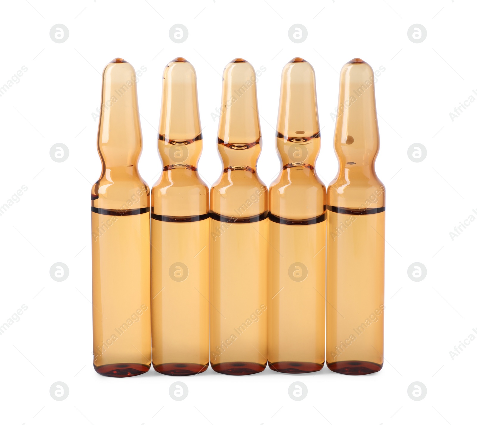 Photo of Brown pharmaceutical ampoules with medication on white background