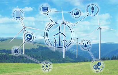 Image of Alternative energy source. Wind turbines in field under blue sky and scheme
