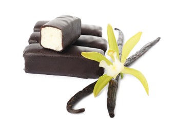 Glazed curd cheese bars, vanilla pods and flower isolated on white