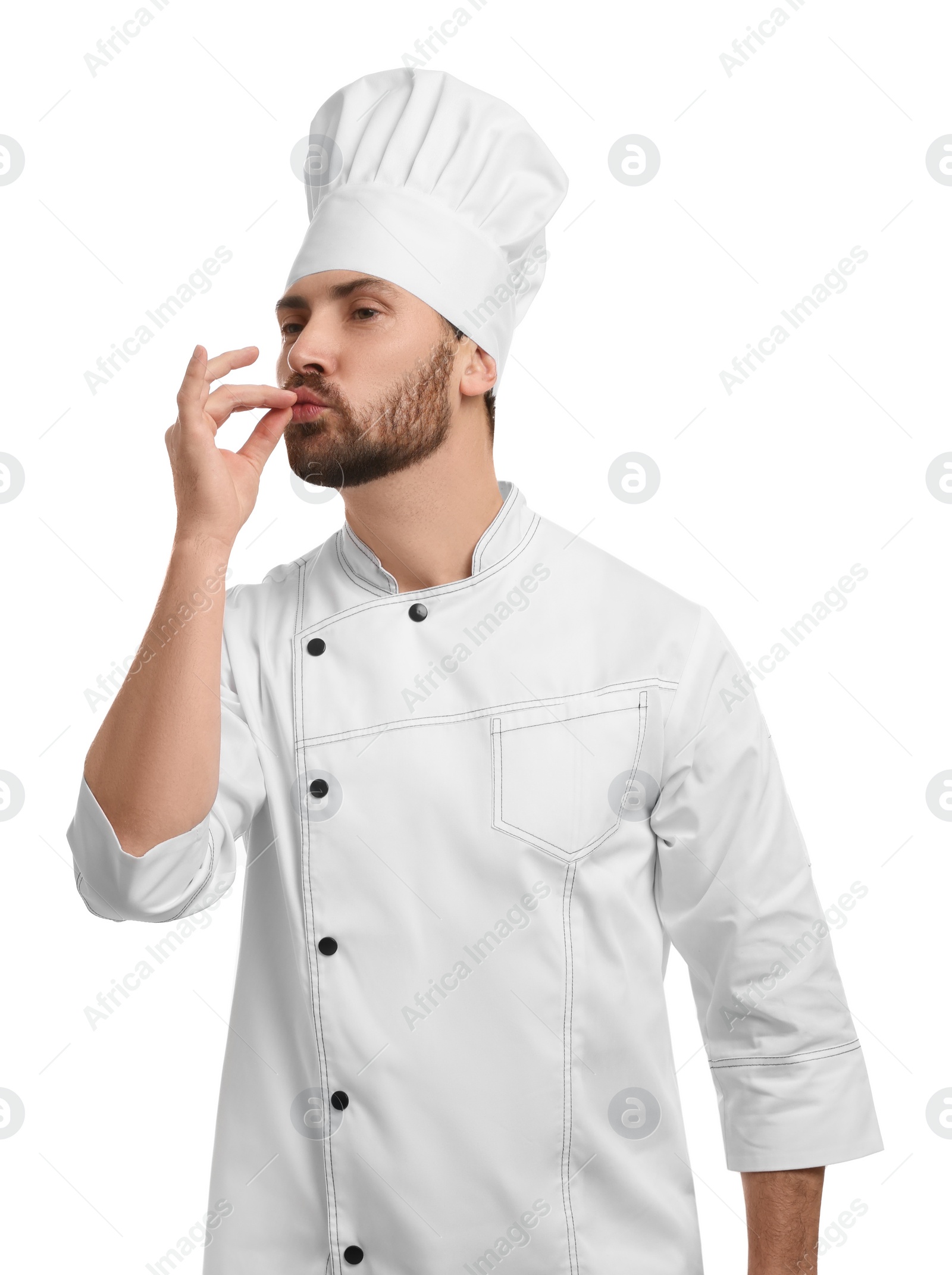 Photo of Mature chef showing delicious gesture on white background