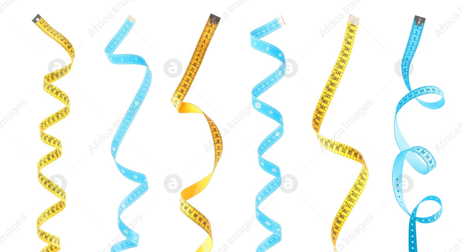 Image of Set with different measuring tapes on white background