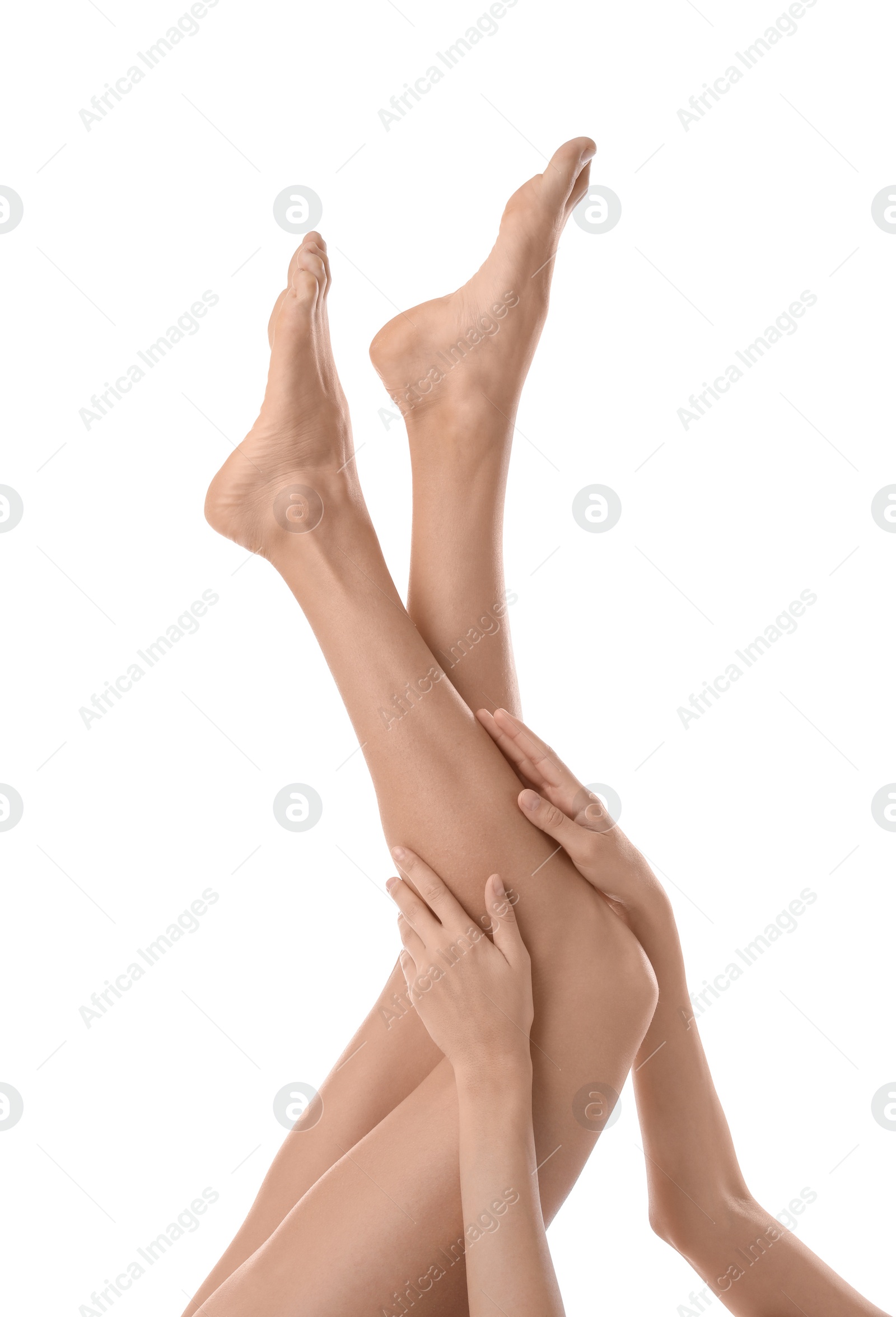 Photo of Young woman with beautiful long legs on white background, closeup