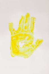 Photo of Color palm print on white background. Child's painting