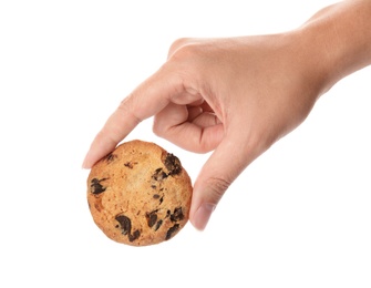 Woman holding tasty chocolate chip cookie on white background, closeup