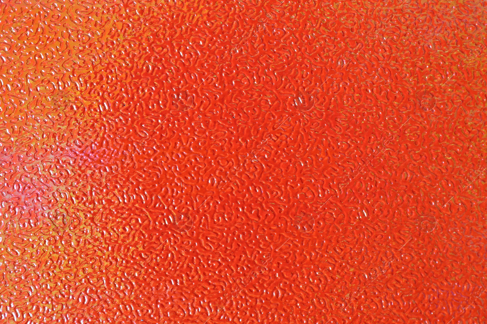 Photo of Orange textured surface as background, closeup view