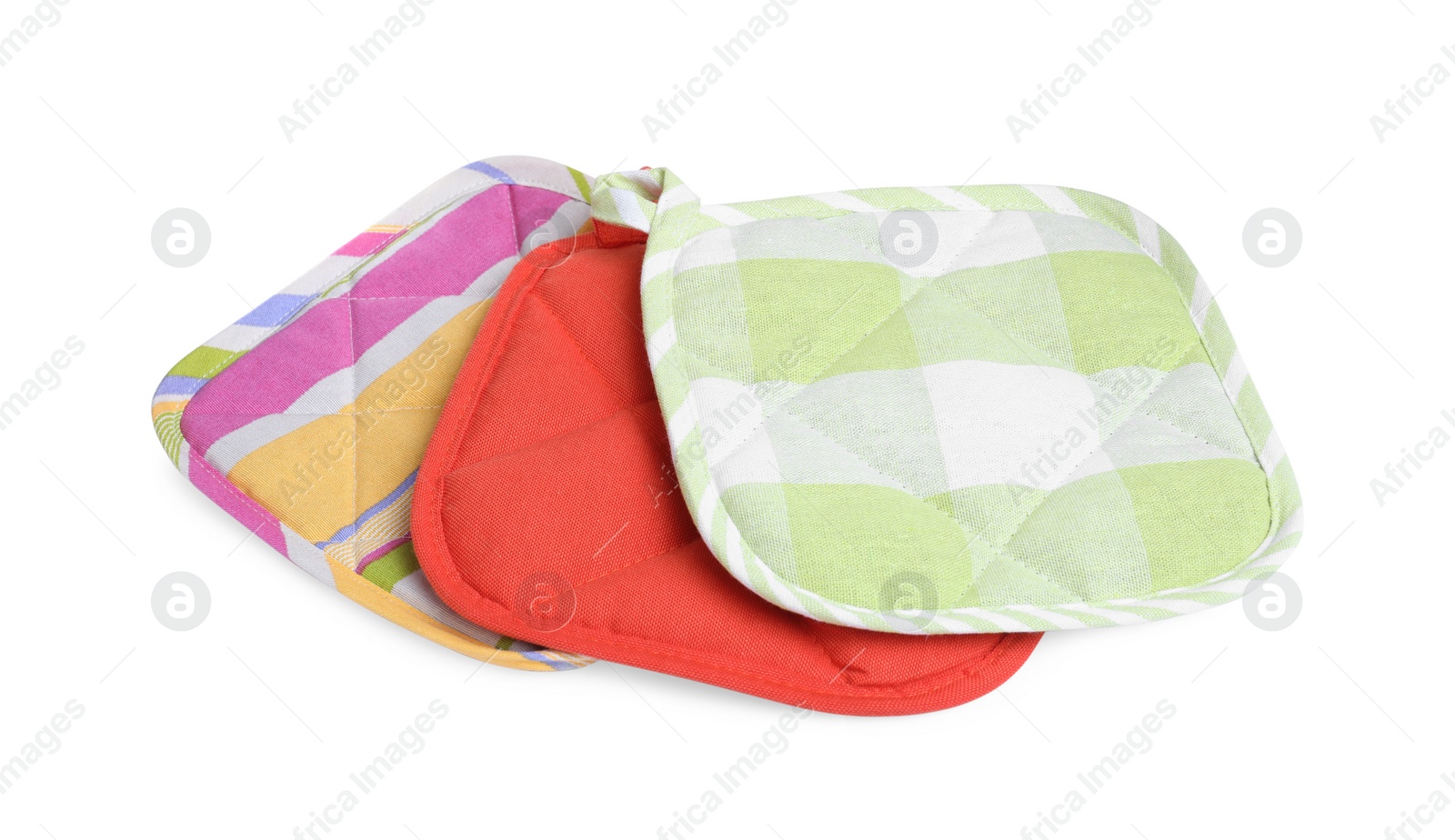 Photo of Set of oven potholders for hot dishes on white background