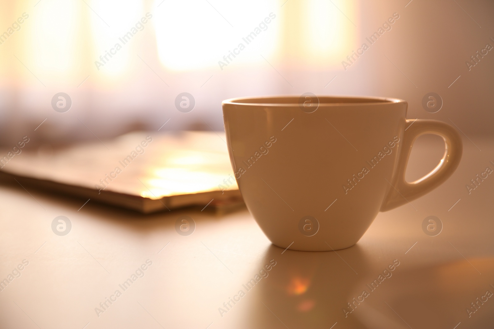 Photo of Cup of hot drink on table, space for text. Lazy morning