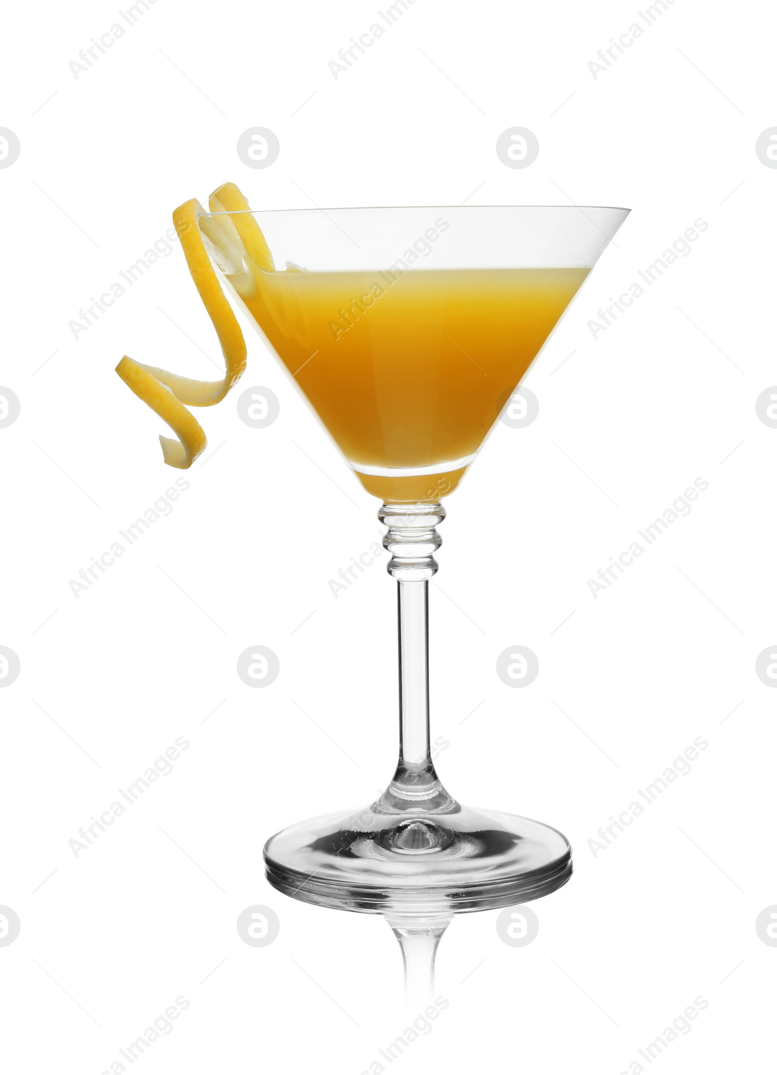 Photo of Glass of martini cocktail with lemon zest on white background