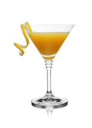 Glass of martini cocktail with lemon zest on white background