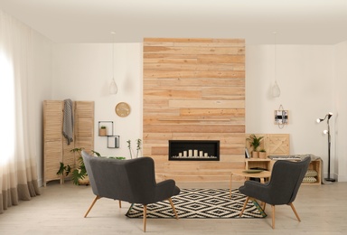 Photo of Living room interior with decorative fireplace in wooden wall