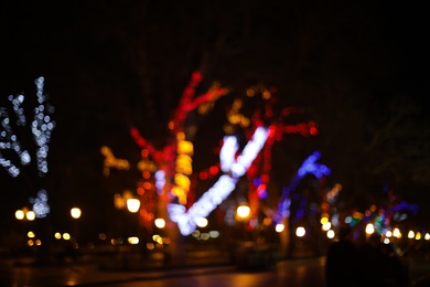 Photo of Beautiful street lights at night. Bokeh effect