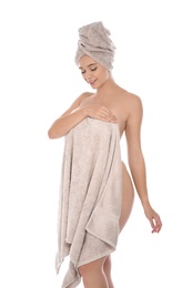 Photo of Portrait of young pretty woman with towels on white background