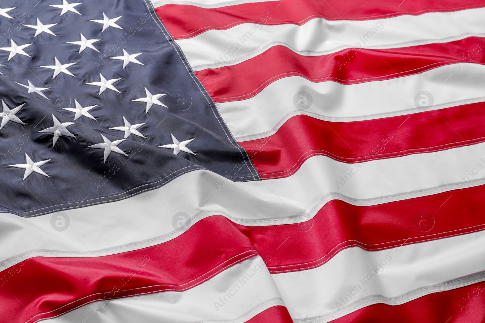 Photo of Beautiful national flag of USA as background, closeup