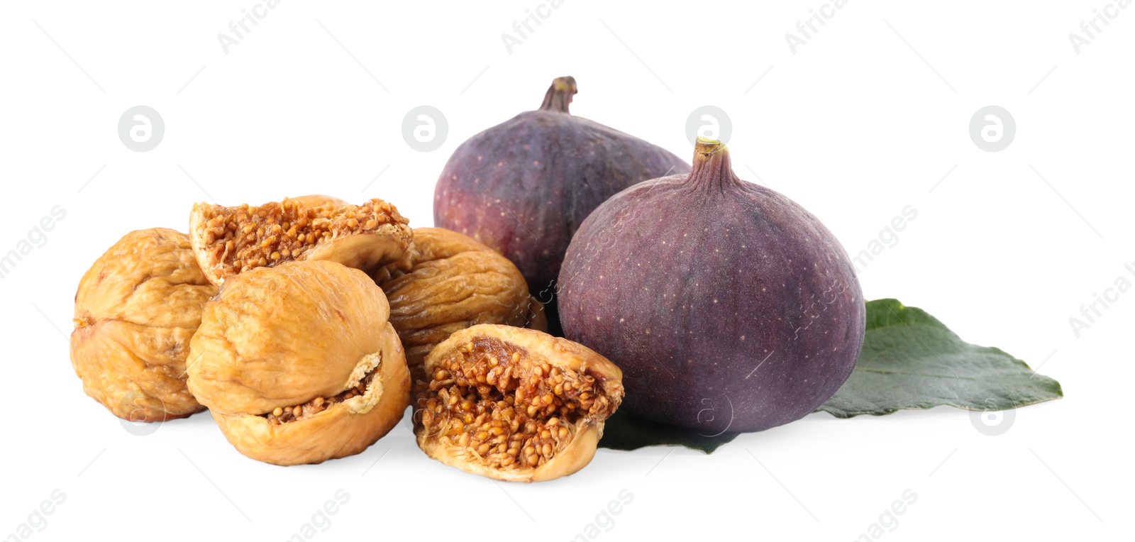 Photo of Tasty dried and raw figs with leaf on white background