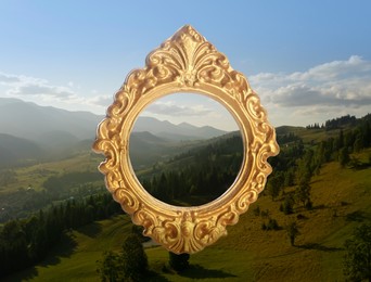 Image of Vintage frame and beautiful mountains under blue sky with clouds in morning